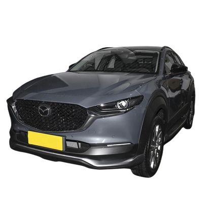 Un bon prix. 450 km de portée Mazda CX 30 EV Voiture électrique en blanc/bleu/rouge/platine en acier gris/gris extrême avec de Mazda en ligne